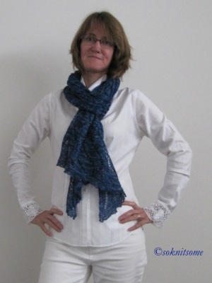 blue lace wrap looped around neck