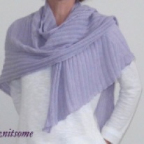 Lilac-coloured shawl wrapped on shoulders