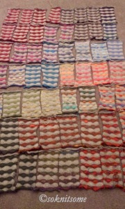 stripy blanket squares laid out for sewing together